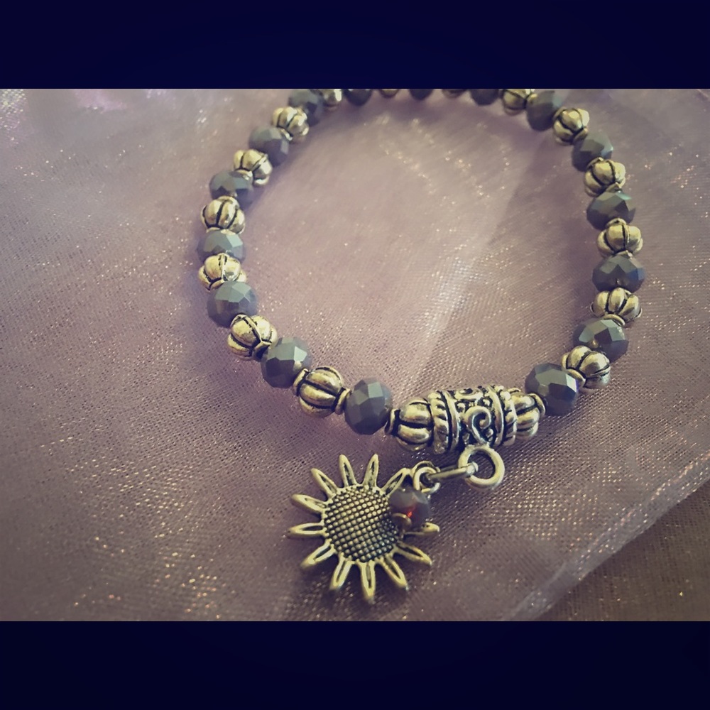 Handmade beaded bracelet with charm
